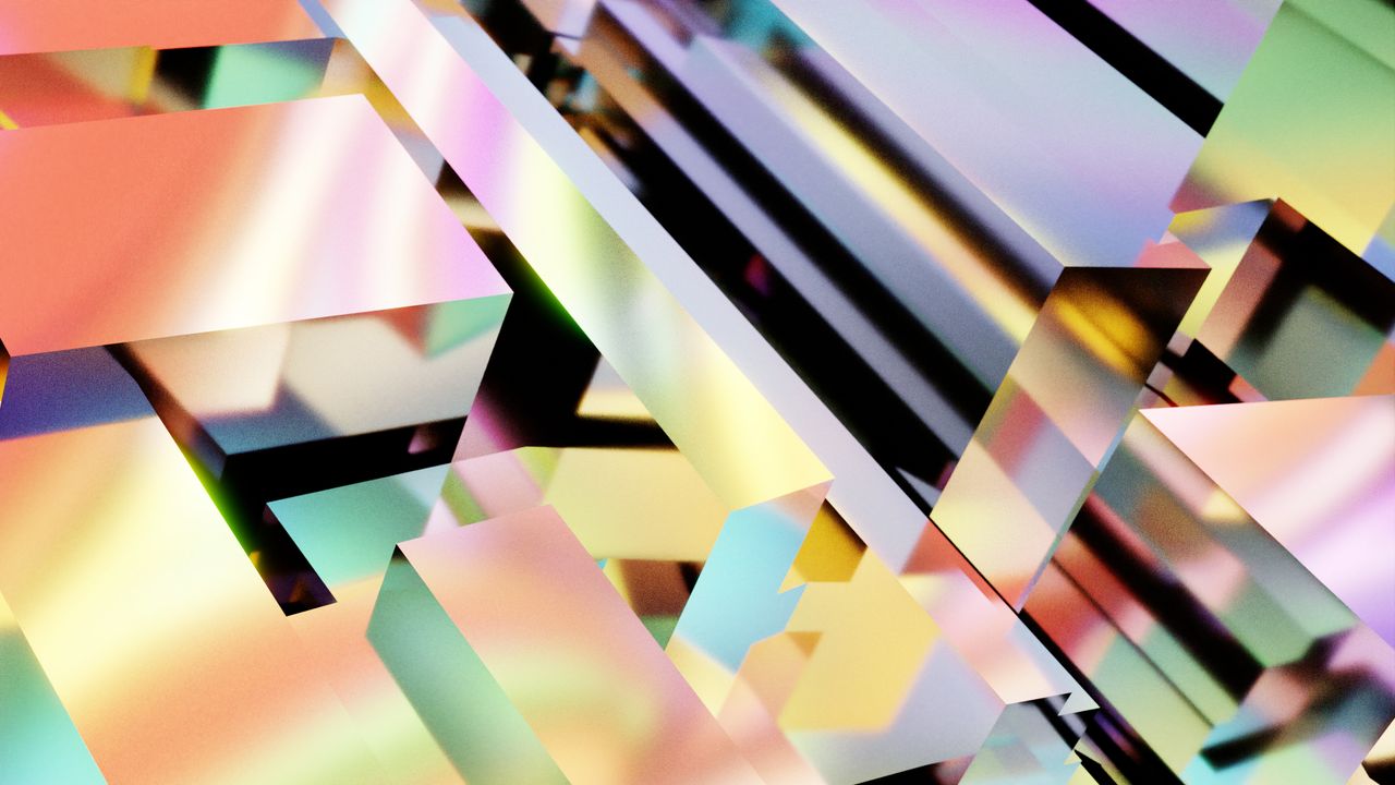 Vibrant abstract geometric design with prism effect and rainbow colors.